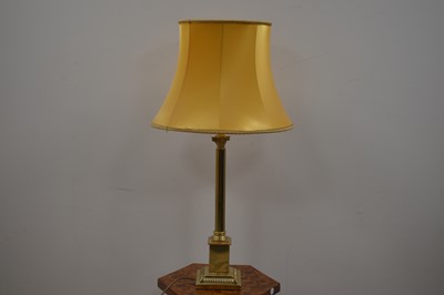 Lot 414 - A tall Corinthian column shaped brass table lamp