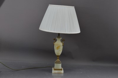 Lot 415 - An alabaster and brass  urn shaped table lamp