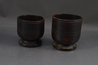 Lot 431 - Two turned lignum virtue vessels possibly master salts