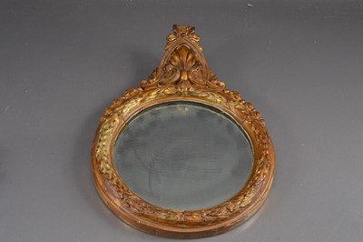 Lot 435 - An ornate round gilt gesso wall mirror of neat size