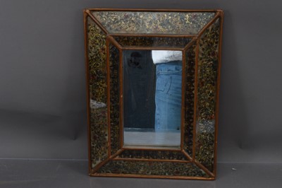 Lot 436 - A verre églomisé framed mirror