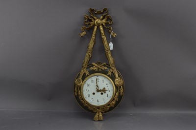 Lot 446 - A French Empire style gilt bronze cartel clock