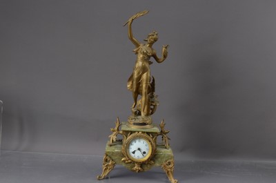 Lot 451 - A Late 19th to Early 20th Century French Spelter and Onyx Mantel Clock