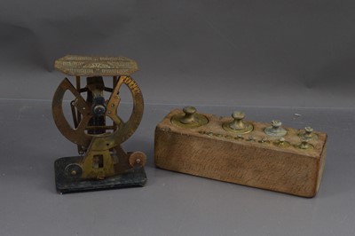 Lot 463 - A set of Brass Weights in a Mahogany Block together with a set of Small Scales