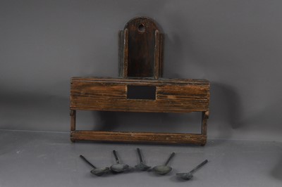 Lot 469 - An antique treen wall-mounted spoon rack