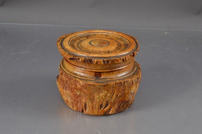 Lot 473 - An antique treen carved burrwood table snuff box and cover