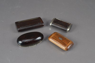 Lot 475 - A group of four 19th Century treen pocket snuff boxes