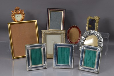 Lot 493 - Three English Sterling Silver Frames with velvet backs