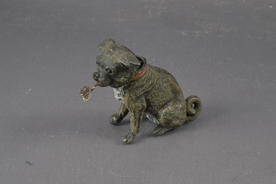 Lot 510 - An antique cold-painted spelter figure of a nodding dog