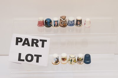 Lot 563 - A collection of porcelain and other thimbles