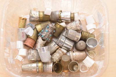 Lot 564 - A collection of metal thimbles