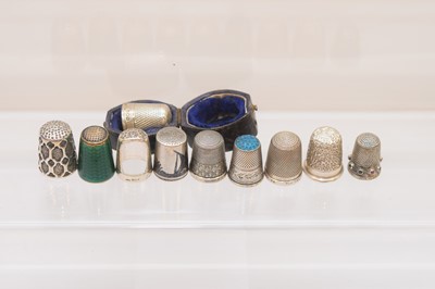 Lot 566 - Ten silver thimbles