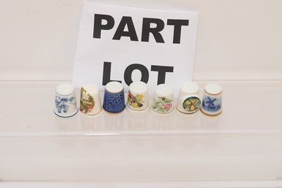 Lot 572 - A collection of porcelain and other thimbles