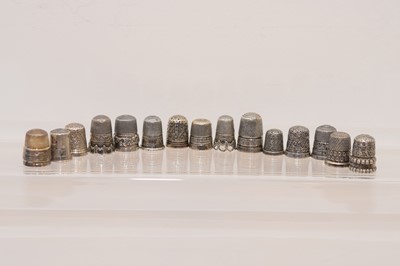 Lot 574 - Fifteen silver and white metal thimbles