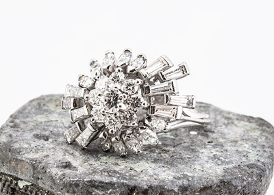 Lot 2 - A c1960s 18ct white gold and diamond cocktail dress ring