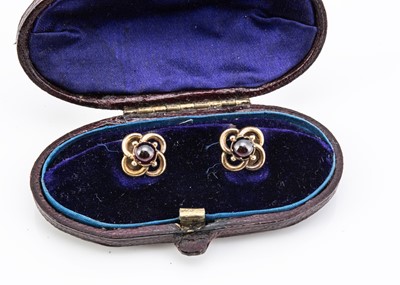 Lot 14 - A pair of Victorian 9ct gold and garnet dress studs