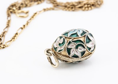 Lot 40 - A Soviet silver gilt and enamel Faberge style egg pendant