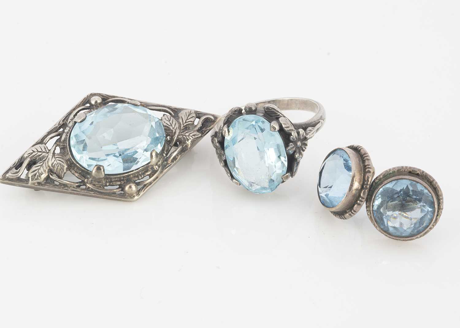 Lot 74 - A small collection of blue paste and silver set jewels