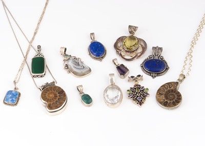 Lot 90 - A collection of gem set silver pendants