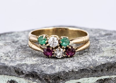 Lot 94 - A double three stone diamond, ruby and emerald dress ring