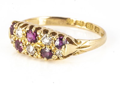 Lot 76 - An 18ct yellow gold ruby and diamond checkerboard dress ring