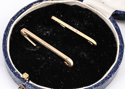 Lot 110 - Two 9ct gold monogrammed safety pins