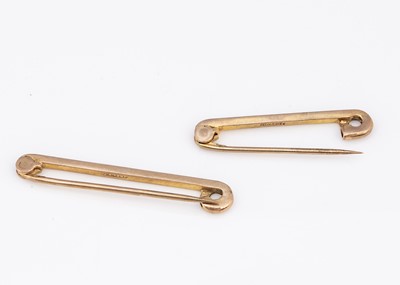 Lot 110 - Two 9ct gold monogrammed safety pins