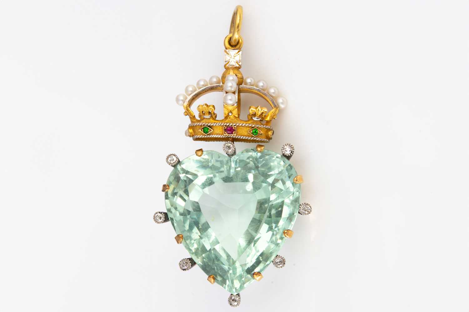 121 - An impressive aquamarine, diamond and crown set pendant,