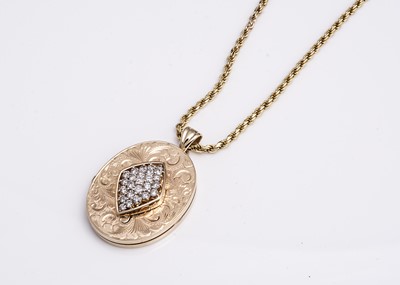 Lot 148 - A 9ct gold diamond set oval locket