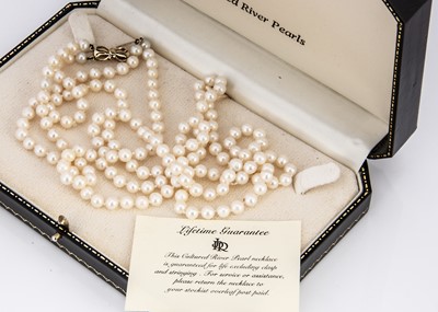 Lot 164 - A double row of knotted strung fresh water pearls