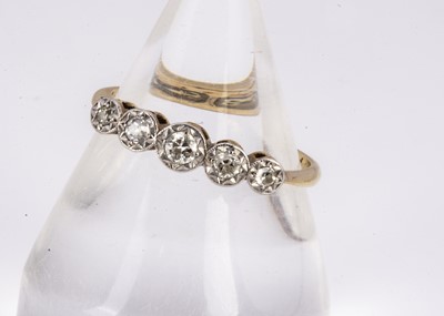 Lot 177 - An early 20th century old cut diamond five stone dress ring