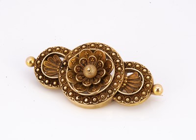 Lot 182 - A Victorian yellow metal filigree floral brooch