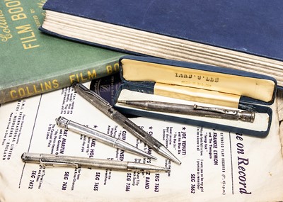 Lot 193 - Four silver retractable pencils