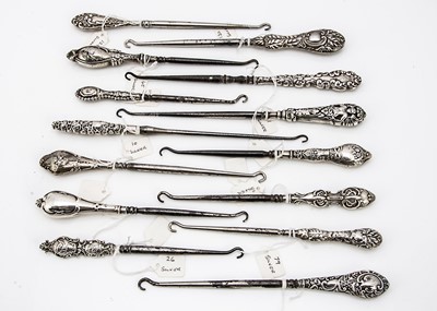 Lot 199 - A collection of Victorian and later silver handled button hooks