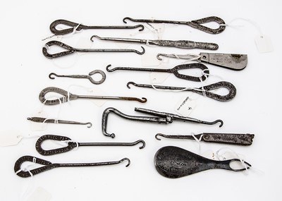 Lot 200 - Fifteen Victorian and later Advertising and Retailers metal button hooks and shoe horns