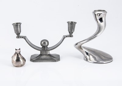 Lot 239 - A modern stainless steel candle holder by Robert Welsh