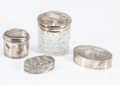 Lot 242 - Three silver boxes and a cut glass and silver lidded pot