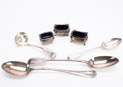 Lot 260 - A pair of silver trench salts and another salt and four silver plated spoons