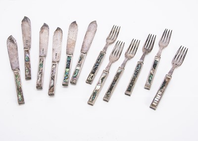 Lot 261 - An Arts & Crafts silver and mother of pearl set of six fish knives and forks by S Bs