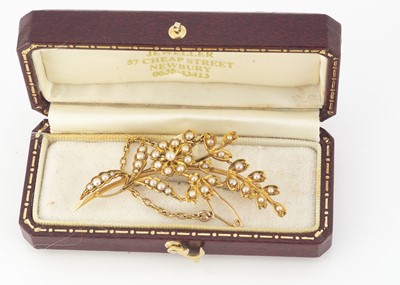 Lot 92 - A 15ct gold seed pearl floral brooch