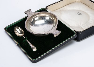 Lot 298 - A cased George V silver quaiche and spoon set