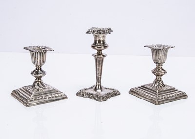 Lot 306 - A pair of Victorian silver filled short candlesticks