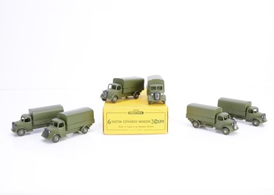 Lot 46 - A Dinky Toys 30sm Austin Military Covered Wagon Trade Box