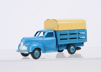 Lot 86 - A French Dinky Toys 25L Studebaker Tapissiere Covered Truck