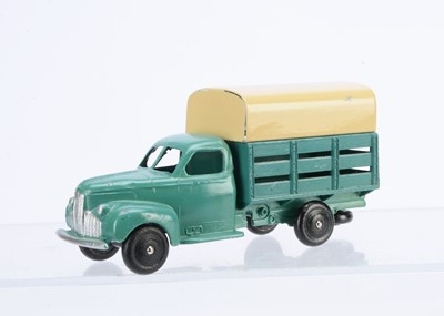 Lot 87 - A French Dinky Toys 25L Studebaker Tapissiere Covered Truck