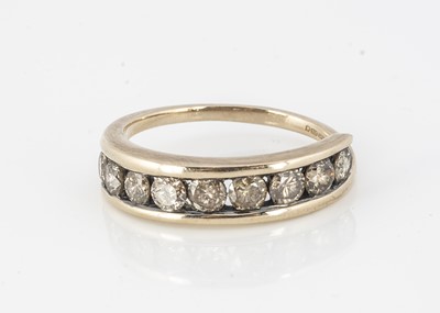 Lot 329 - A continental diamond nine stone dress ring