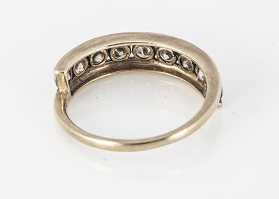 Lot 329 - A continental diamond nine stone dress ring