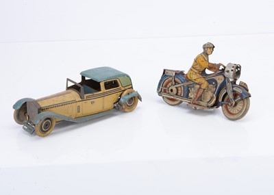 Lot 529 - Arnold clockwork tinplate  Motorcycle and Wells Tinplate Rolls Royce Coupe (2)