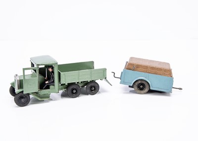 Lot 584 - Britains uncommon civilian / farm vehicles comprising 4 wheel lorry in light green - probably an extremely well presented repaint - with civilian driver