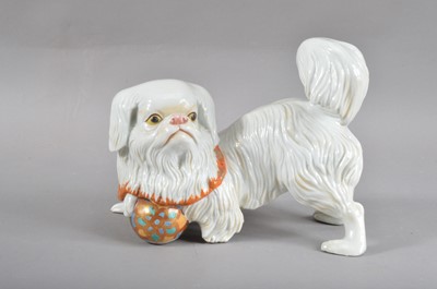Lot 142 - A 20th century Japanese Kutani porcelain figurine of a dog